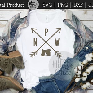 PNW with arrows and Oregon state silhouette shown as a design on a t shirt with plaid shirt and boots