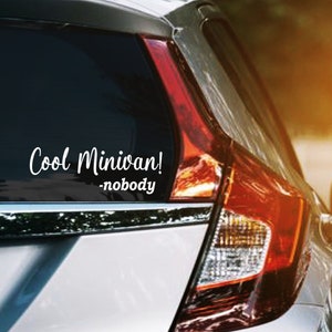 May include: A silver minivan with a white vinyl sticker on the back window that reads "Cool Minivan! -nobody".
