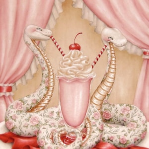 May include: Two white snakes with pink floral patterns are wrapped around a milkshake with whipped cream and a cherry on top. The snakes are holding red and white striped straws in their mouths. The milkshake is in a clear glass with a pink liquid and is sitting on a red surface.