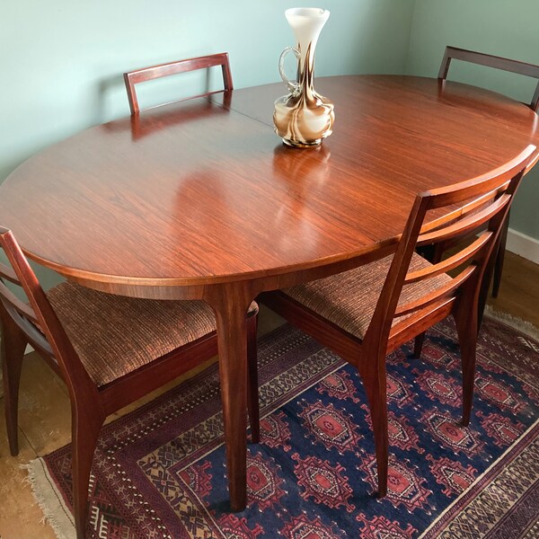 Mid Century McIntosh rosewood extending dining table and chairs