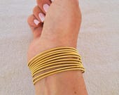 Bracelets ressorts cordes de guitare en acier inoxydable doré : joncs souples, légers et brillants, lot de 5, 10 ou 20 bracelets originaux