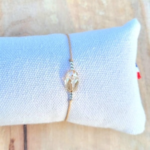 Beige cord with Swarovski crystal scarab and sterling silver beads