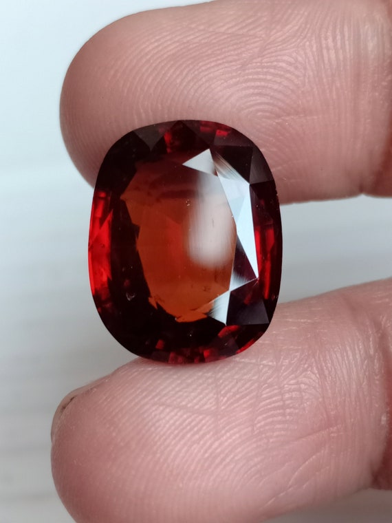 Natural Orange Hessonite Garnet: 18.09 Carat Oval Gemstone