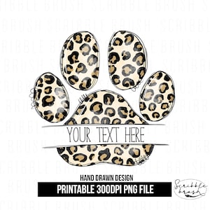 May include: A paw print design with a leopard print pattern, featuring the text "YOUR TEXT HERE". The design includes the text "HAND DRAWN DESIGN" and "PRINTABLE 300DPI PNG FILE". The paw print is black and tan.