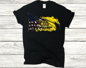 May include: Black t-shirt with a distressed design combining the American flag and the yellow Gadsden flag. The graphic includes the words "Don't Tread on Me" and a coiled snake.