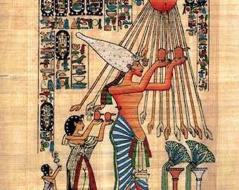 May include: A colorful illustration of an Egyptian goddess with a sun disk above her head. She is holding two objects in her hands and is surrounded by hieroglyphs. Two smaller figures are standing in front of her, one holding a staff and the other holding a flower. The text at the bottom of the image reads "عادى فرعون".