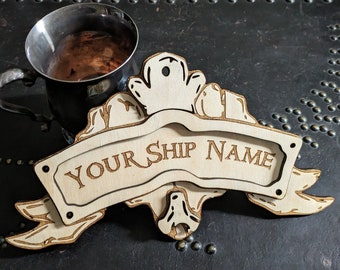 Sea Of Thieves inspired personalised wooden ship name crest.  Made from laser cut wood.