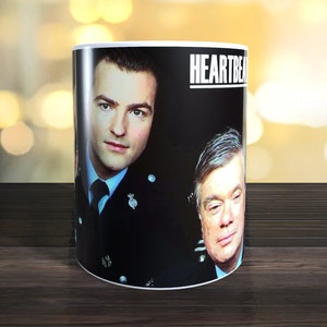 Hartslagmok. Retro-tv, afbeelding om de mok.