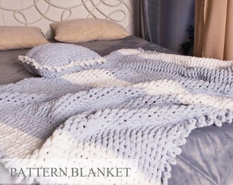 Modello per coperta in filato ad anello: onda lavorata a maglia con le dita e frange (PDF)