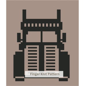 May include: A pixelated black graphic of a semi-truck front view centred on a solid taupe background. The design features a rectangular grille, vertical exhaust stacks, and side mirrors. The text Finger Knit Pattern is printed in white.