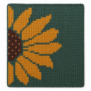 May include: A square knitted textile featuring a dark green background with a partial sunflower design. The sunflower is composed of golden yellow petals and a dark brown centre, all created through a visible knit stitch pattern on the fabric.