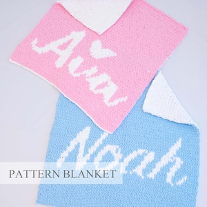 May include: Two knitted baby blankets, one pink and one blue, with white lettering. The pink blanket says "Ava" and the blue blanket says "Noah". The blankets have white borders and the text "PATTERN BLANKET" is at the bottom.
