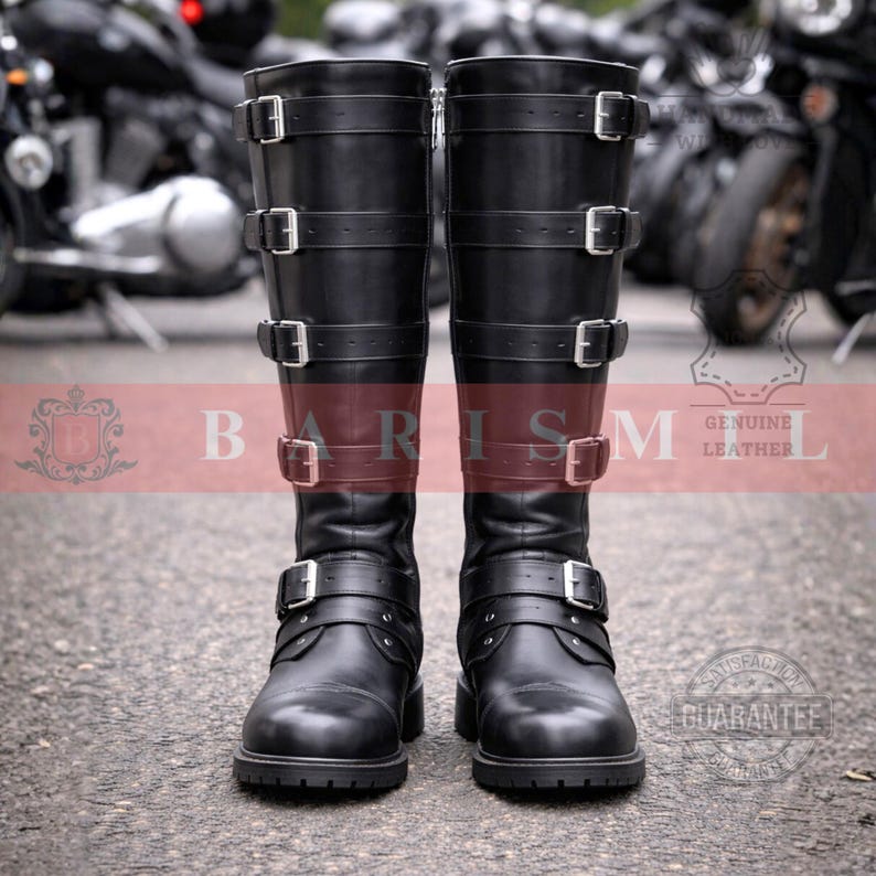May include: A pair of black leather knee-high boots with multiple buckle straps. The boots have a rugged sole and a zipper on the side. The image includes the text "BARISM" and "GENUINE LEATHER".