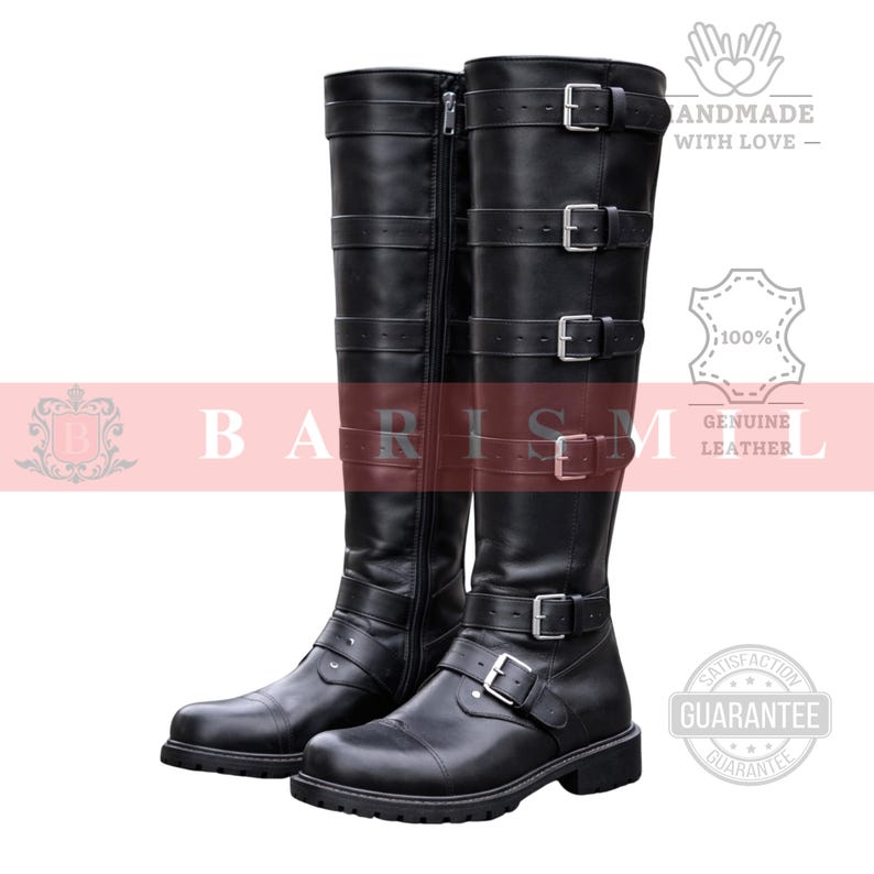May include: A pair of black leather knee-high boots with multiple straps and silver buckles. The boots have a zipper on the side and a rounded toe. The boots are handmade with genuine leather.