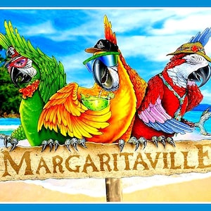 May include: Three parrots wearing hats and sunglasses are perched on a wooden sign that reads "Margaritaville". The parrots are green, orange, and red with blue and pink accents. The sign is on a beach with blue water and white sand.