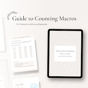 May include: A digital tablet displaying a white and grey graphic design with the text "HEALTH & FITNESS Macro Guide HOW TO CALCULATE & COUNT MACROS". The tablet is on a white surface with a white and grey patterned design.