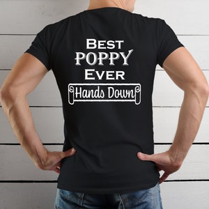 May include: Black t-shirt with white text that reads "Best Poppy Ever Hands Down".