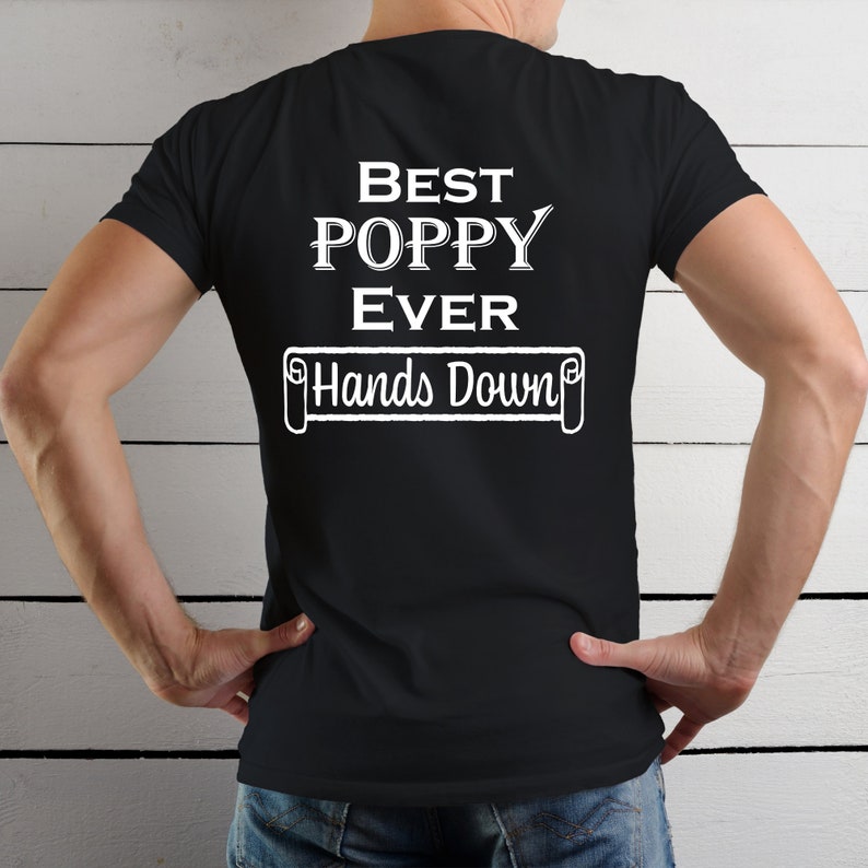 May include: Black t-shirt with white text that reads "Best Poppy Ever Hands Down".