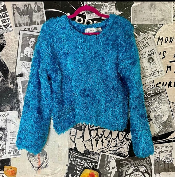 Vintage 1980’s fuzzy electric blue sweater.