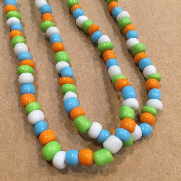 unlabeled pride flag seed bead necklace