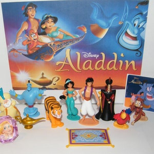 May include: A set of 10 Disney Aladdin figurines, including Aladdin, Jasmine, Genie, Abu, Jafar, Rajah, the Magic Carpet, and the Cave of Wonders. The figurines are made of plastic and are brightly colored. The set comes with a Disney Aladdin card.