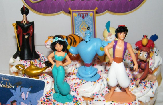 Flying Carpet Etc! Aladdin Movie Deluxe Cake Toppers Cupcake Decorations 12 Set with 10 Figures Magic Lamp Aladdin Sticker and PrincessRing Featuring Fun Characters 