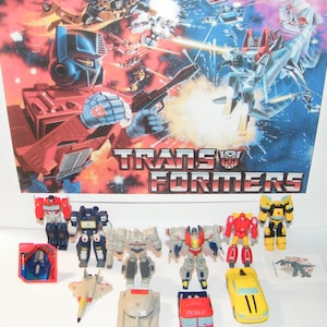Transformers Deluxe Party Favors Set of 12 with 10 Figures and Vehicles, Special Tattoo and ToyRing Featuring Optimus, Bumblebee and More!