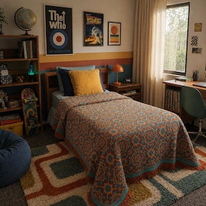 May include: A bedroom with a bed featuring an orange and teal patterned blanket. The room includes a wooden bookcase, a desk, and posters on the wall. A colourful rug and a beanbag chair enhance the decor. The style is retro.