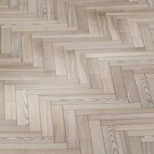 Może przedstawiać: Widok z bliska jasnobrązowej drewnianej podłogi z wzorem w jodełkę.