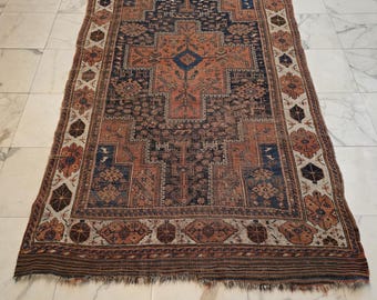 Antique rug 100 years old geometric design