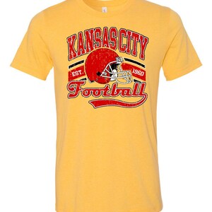 KC Chiefs football helmet distressed unisex t-shirt