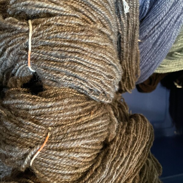 Handspun Romney wool yarn, 4 ozs and 130-140 yds and 10-12 wpi, Aran to Bulky weight.