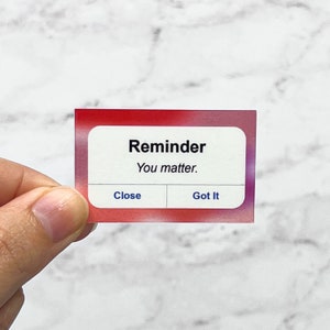 May include: A red and purple reminder note with the text "Reminder You matter." and two buttons: "Close" and "Got It".