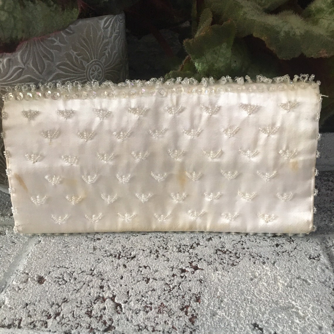 white sequin clutch