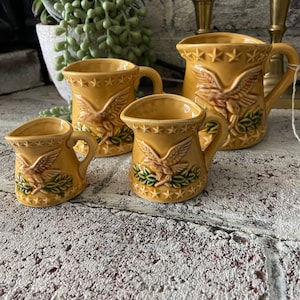 Vintage Chadwick golden eagle measuring cups