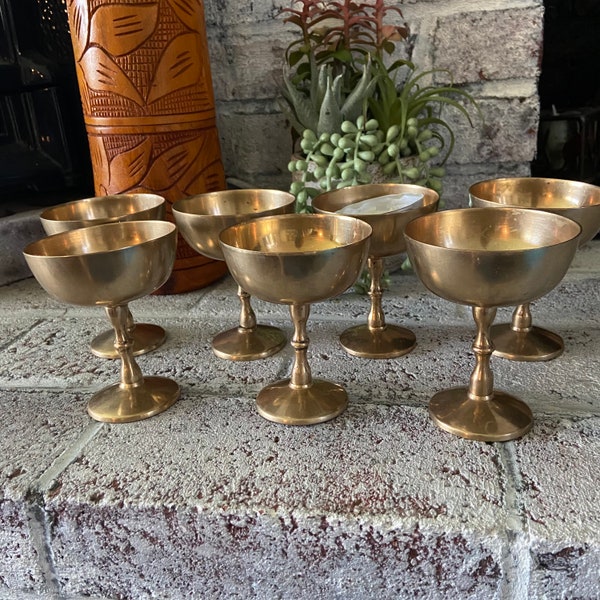 Vintage set of 7 brass chalices, wine glasses, candle holders