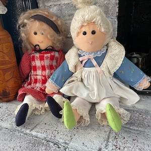 Vintage pair of hand stitched 70s dolls