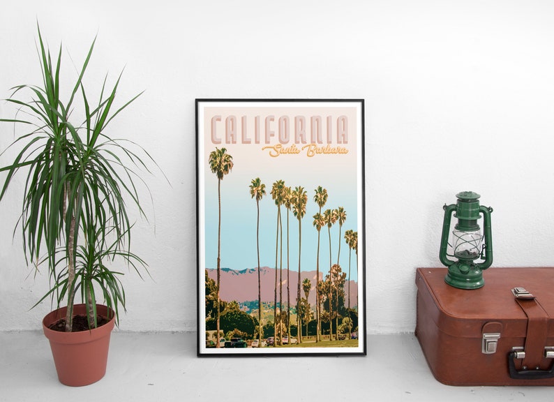 May include: A framed poster with a retro design featuring palm trees and the text "CALIFORNIA Santa Barbara".