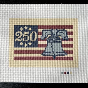 May include: Needlepoint canvas featuring a patriotic design. The artwork includes a blue section with the number "250" and stars, and a red and white striped section. A gray Liberty Bell is centered on the design.
