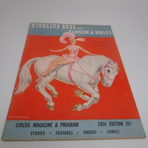 May include: A vintage Ringling Bros. and Barnum & Bailey Circus magazine cover featuring a woman in a pink costume riding a white horse. The cover text reads "Circus Magazine & Program 1954 Edition 25c Stories Features Photos Comics".