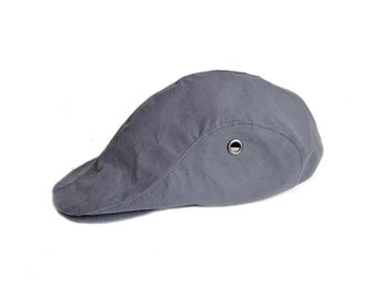 Schiebermütze, Duckbill Cap aus grauem dry British Oilskin, gefüttert. Größe S/M (ca. 56,0 -58,0 cm)