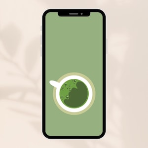 Op de afbeelding: Een smartphone toont een matcha latte-illustratie. Het scherm van de telefoon is lichtgroen, met een witte kop en een matcha-drank in het midden. De matcha is donkergroen met bubbels.