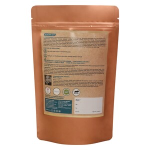 May include: A brown paper bag with a product label listing ingredients, instructions, and benefits. The label includes the text "This is not a cosmetic product, it has therapeutic properties."