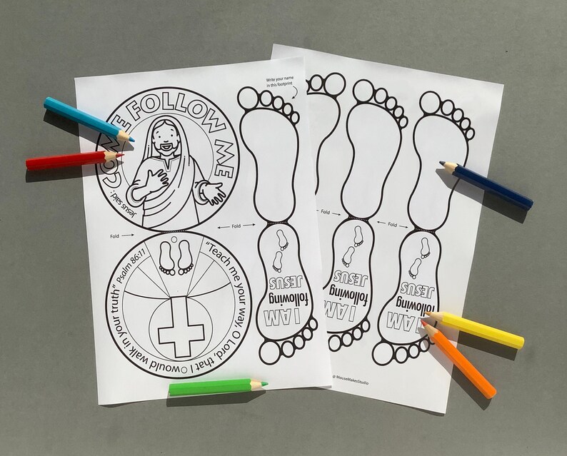 May include: Two white paper sheets with black line drawings of Jesus, footprints, and text. The text includes "Come Follow Me," "I am following Jesus," and Bible verses. Colored pencils in blue, red, green, yellow, and orange are scattered around the papers.