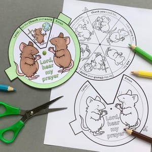 May include: A children's prayer wheel craft kit featuring a wheel with cartoon mice, the text "Lord, hear my prayer," and sections for prayer prompts. Includes pencils and scissors.