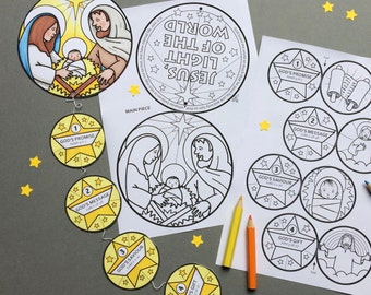 May include: A printable Christmas craft for children featuring a colourful illustration of the nativity scene. The craft includes a main piece with a star and the words "Jesus, Light of the World" and four smaller pieces with the words "God's Promise", "God's Message", "God's Saviour", and "God's Gift".