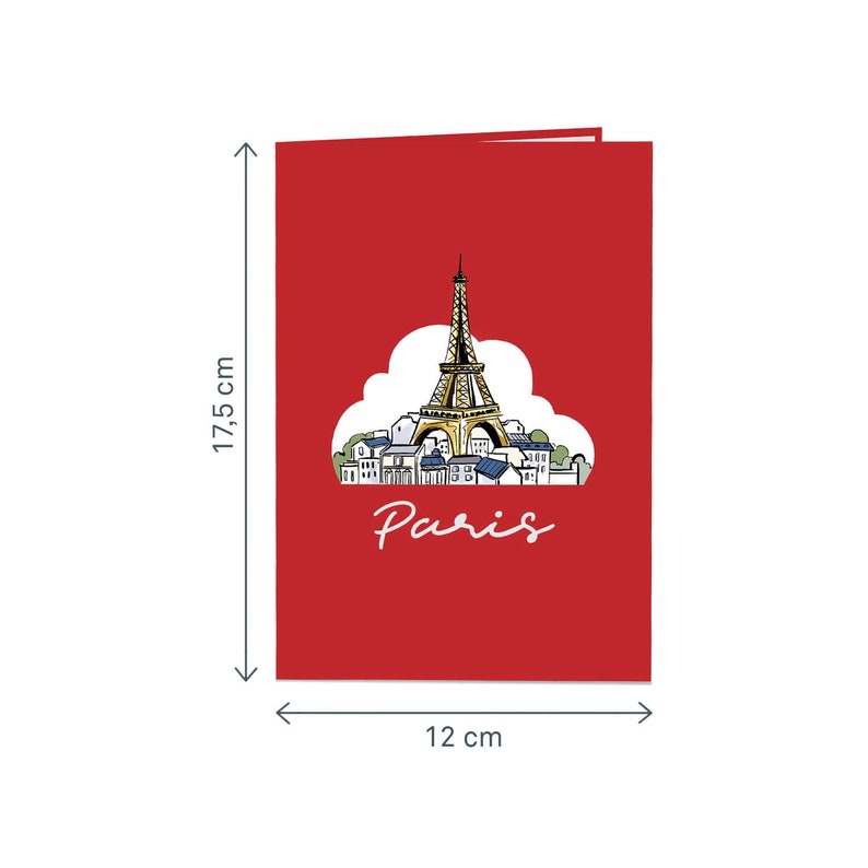Puede incluir: Una tarjeta roja con una ilustraci&oacute;n emergente de la Torre Eiffel en Par&iacute;s, Francia. La tarjeta mide 12 cm por 17,5 cm y dice "Par&iacute;s" en letras blancas.