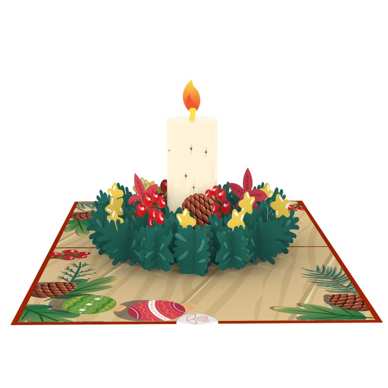 May include: A 3D pop-up card featuring a white candle with a flame, surrounded by a green wreath with red berries, gold stars, and pine cones. The card is on a brown background with a red border.