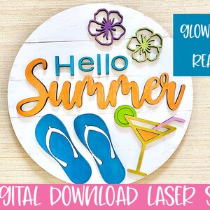May include: A white wooden round sign with the words "Hello Summer" in orange and teal lettering. The sign also features two blue flip flops, a green lime, a yellow and orange cocktail glass with a pink straw, and two purple and green flowers.