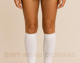 May include: White ribbed knee-high socks. The socks are worn with a gray t-shirt. The text "DIRT ROAD DESIGNS" is printed in a light brown color at the bottom of the image.